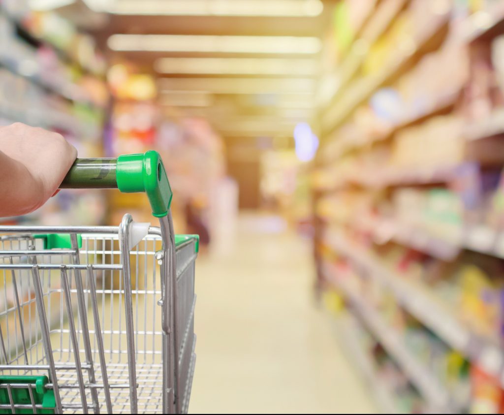 A grocery store being pushed in an aisle to show FDA compliance to be able to sell into stores.